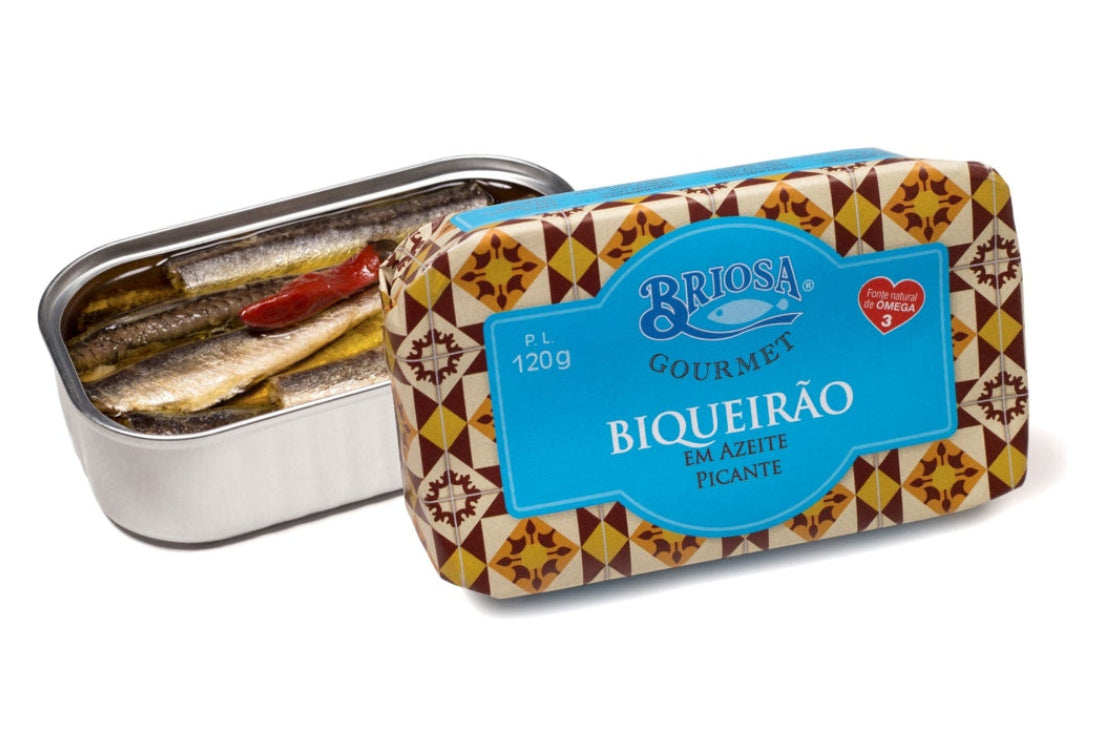 Open can of Briosa Gourmet whole anchovies in spicy olive oil with whole anchovy fillets and chili pepper